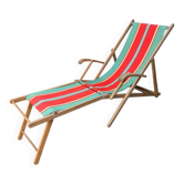 Vintage deck chair with striped green and red fabric, original patina.