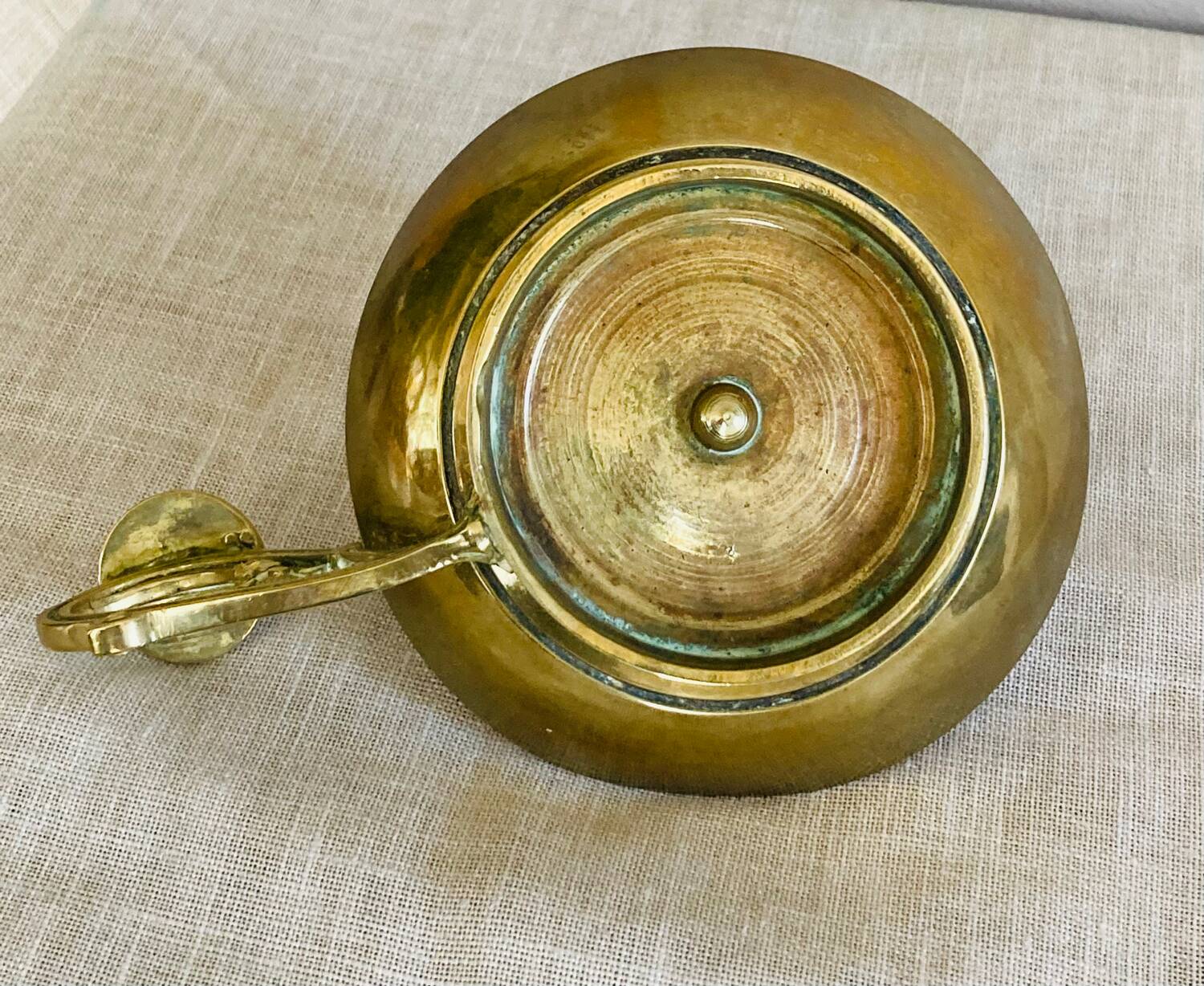 20th century chiseled brass socket candle holder representing Horsemen in armor