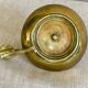 20th century chiseled brass socket candle holder representing Horsemen in armor