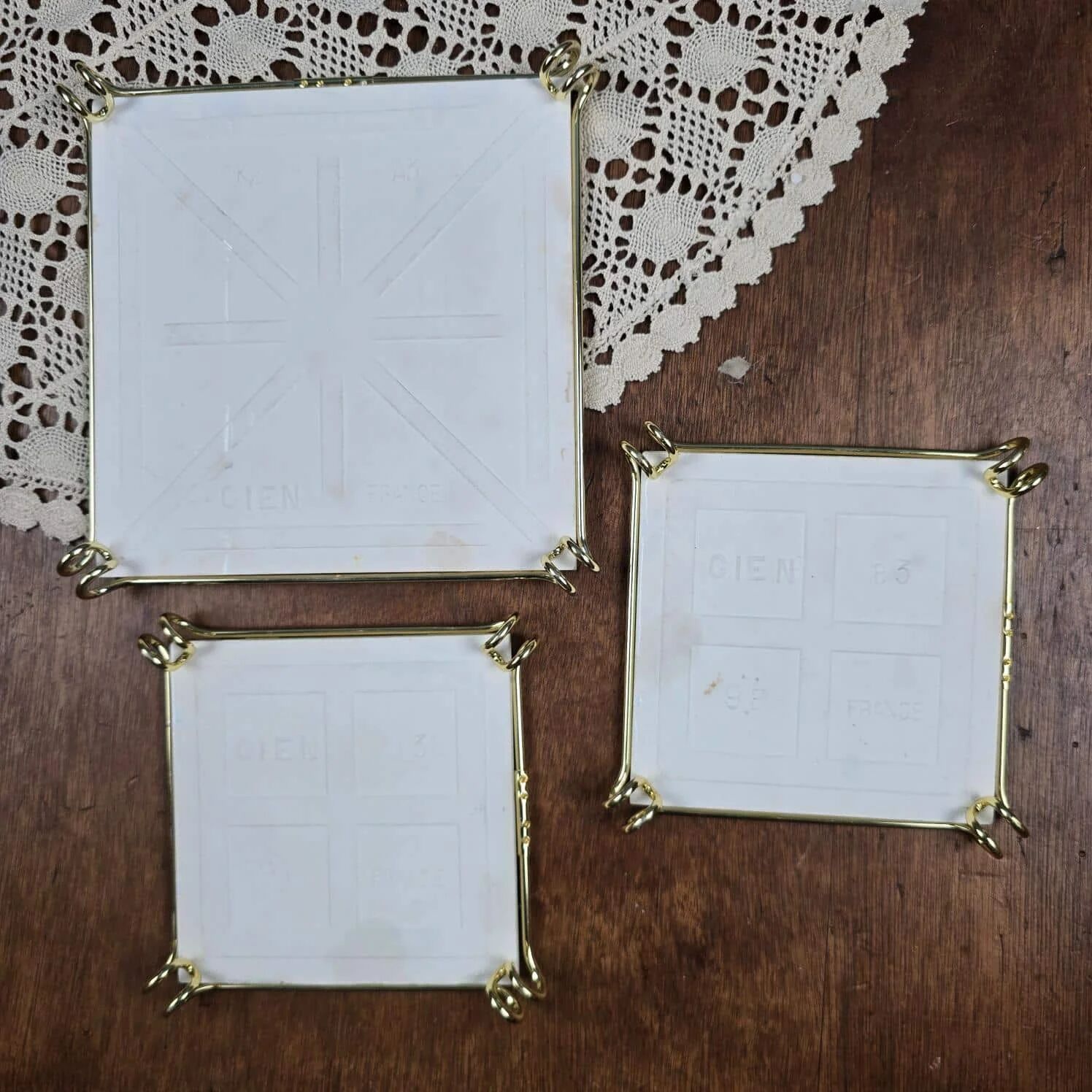 Set of 3 vintage Gien trivets – Retro car, child & couple design