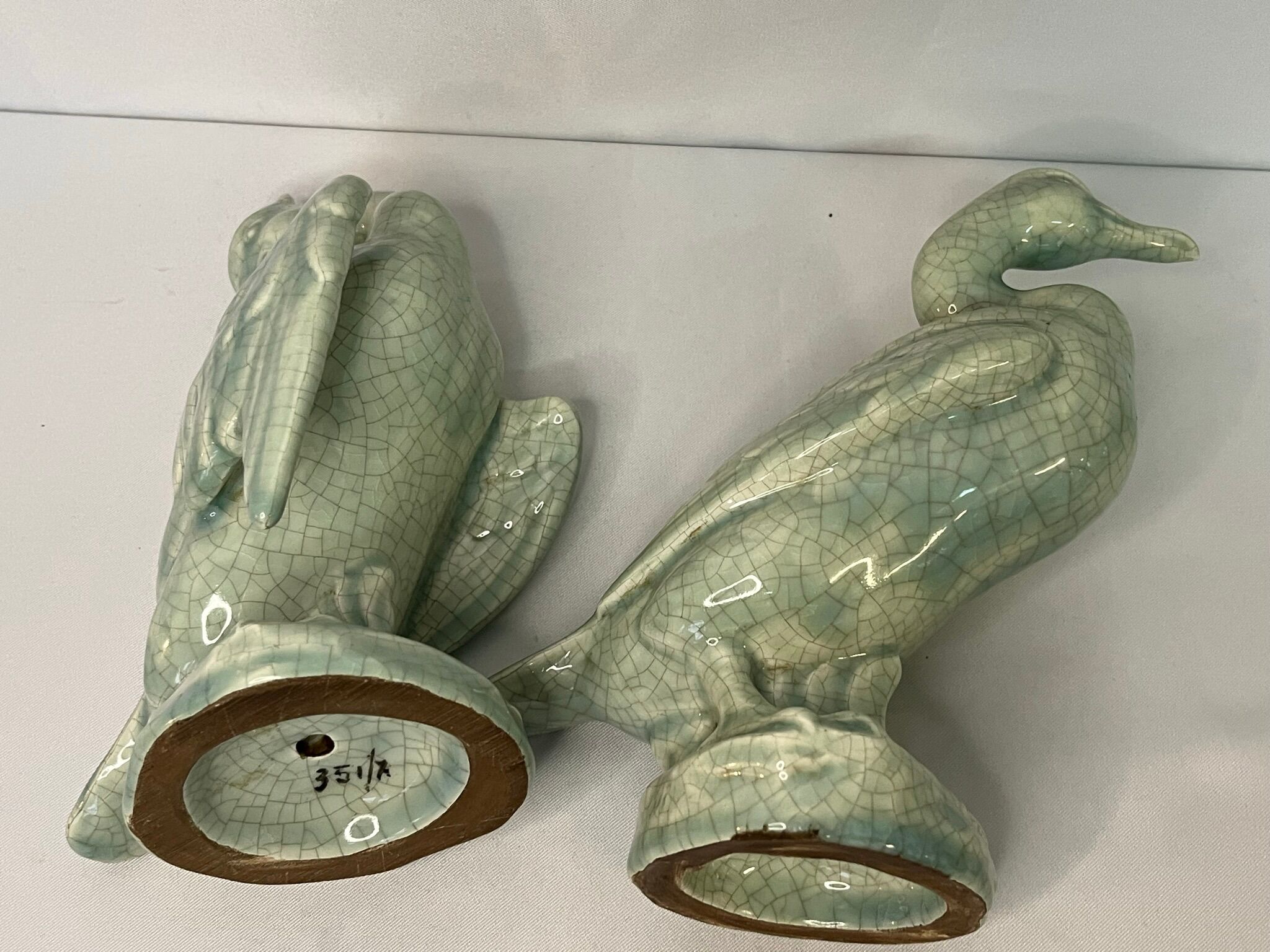 Art Deco Pair cormorants cracked ceramic signed circa 1940