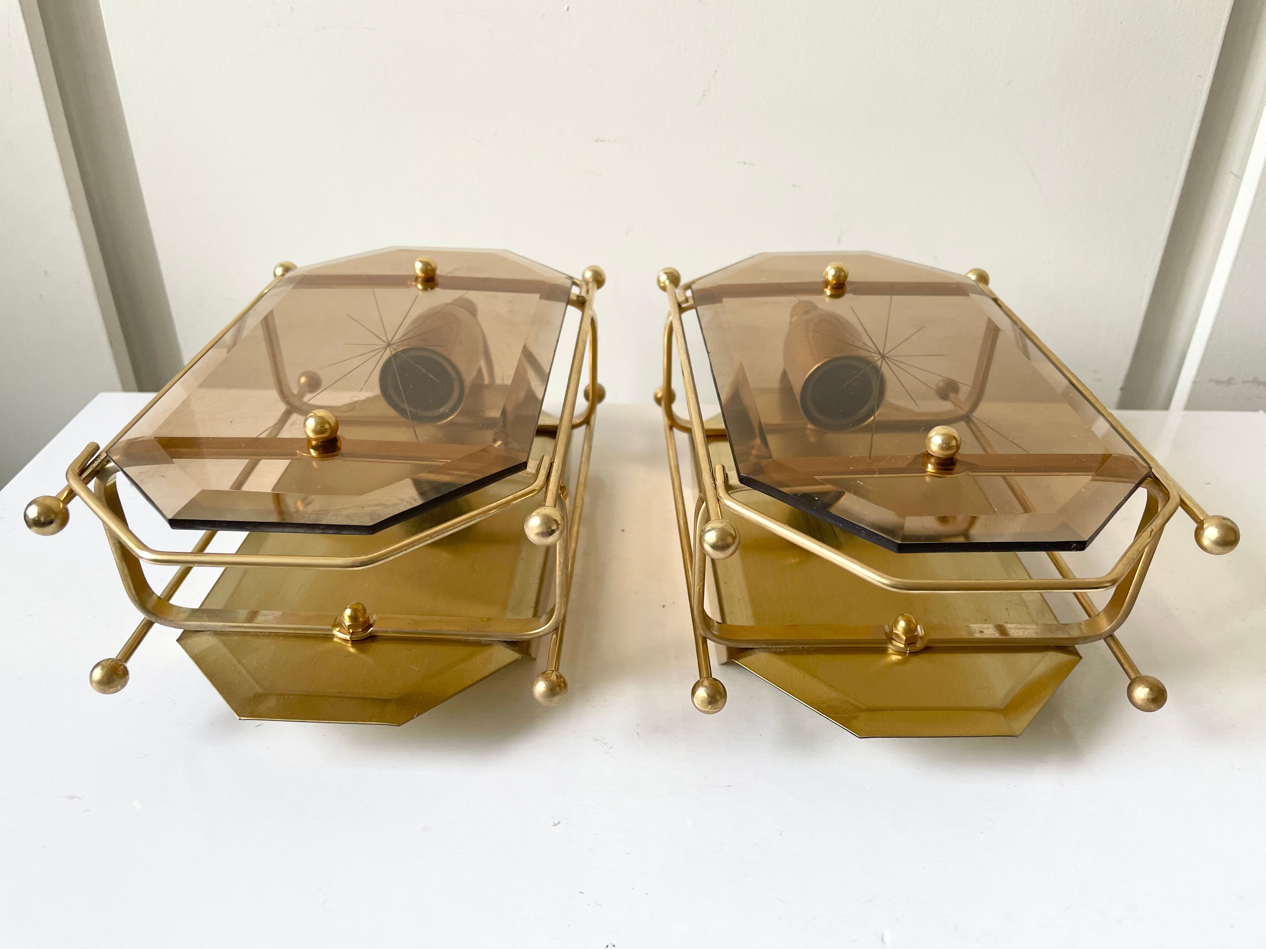 Pair of Scandinavian Vintage  wall light Sconce in Brass & Amber colored Glass