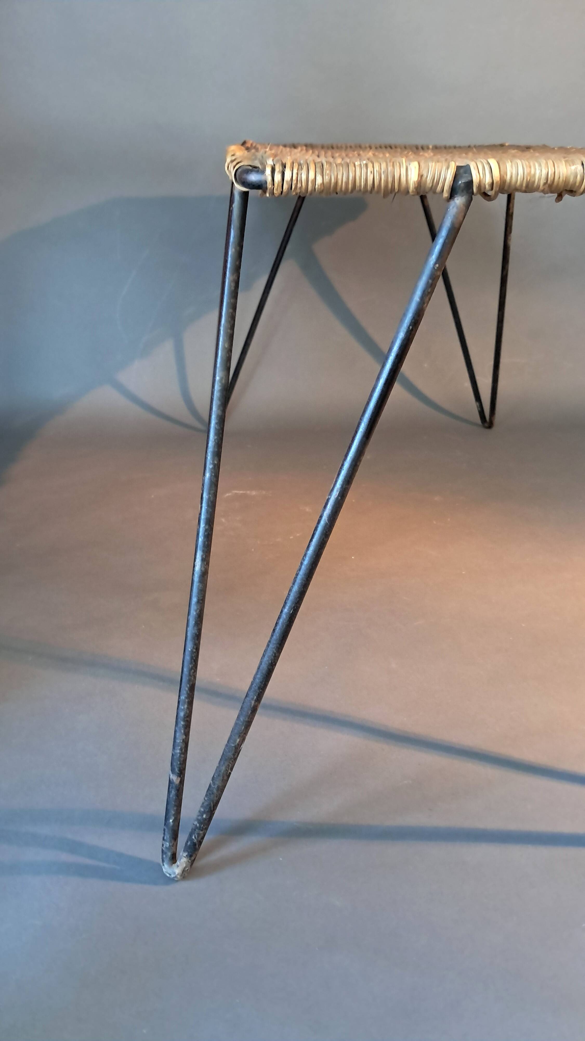 Vintage Raoul Guys coffee table in wicker and black metal, 1960.