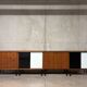 Enfilade buffet display cabinet in vintage 1950s style.