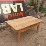 Wooden coffee table with a drawer