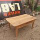Wooden coffee table with a drawer