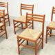 Set of six walnut and rattan dining chairs