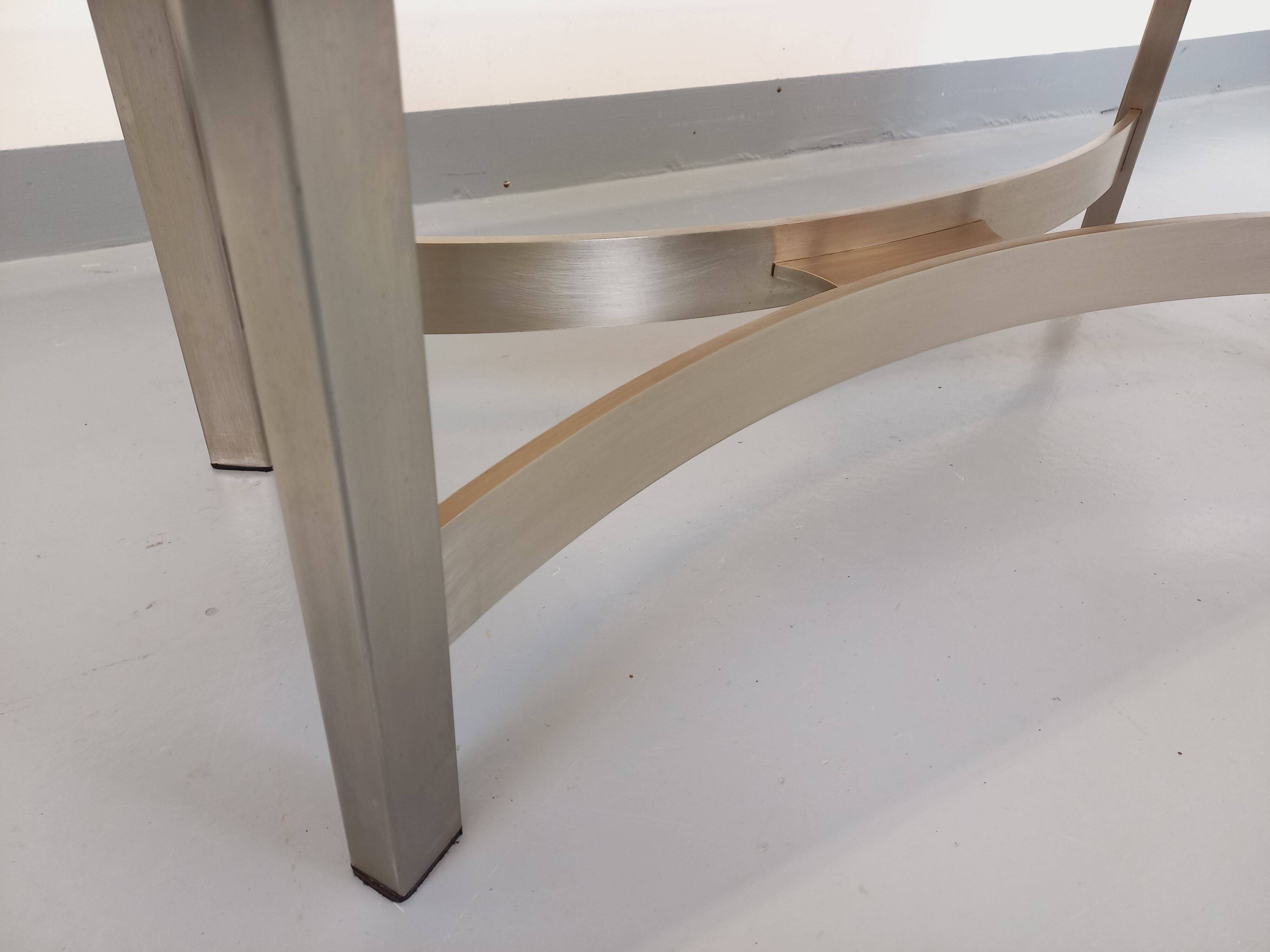 Vintage coffee table in smoked glass and brushed cast aluminum from the 70s