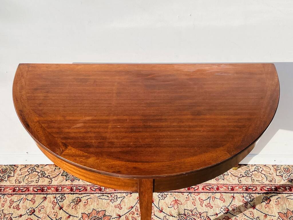Empire-style demi-lune console from the 19th century.