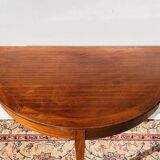 Empire-style demi-lune console from the 19th century.