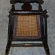 Georgian side bergère circa 1825, ebonised and hand-painted in Baltimore style.