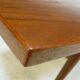 Curved Danish teak coffee table with additional shelf compartment, 1960s