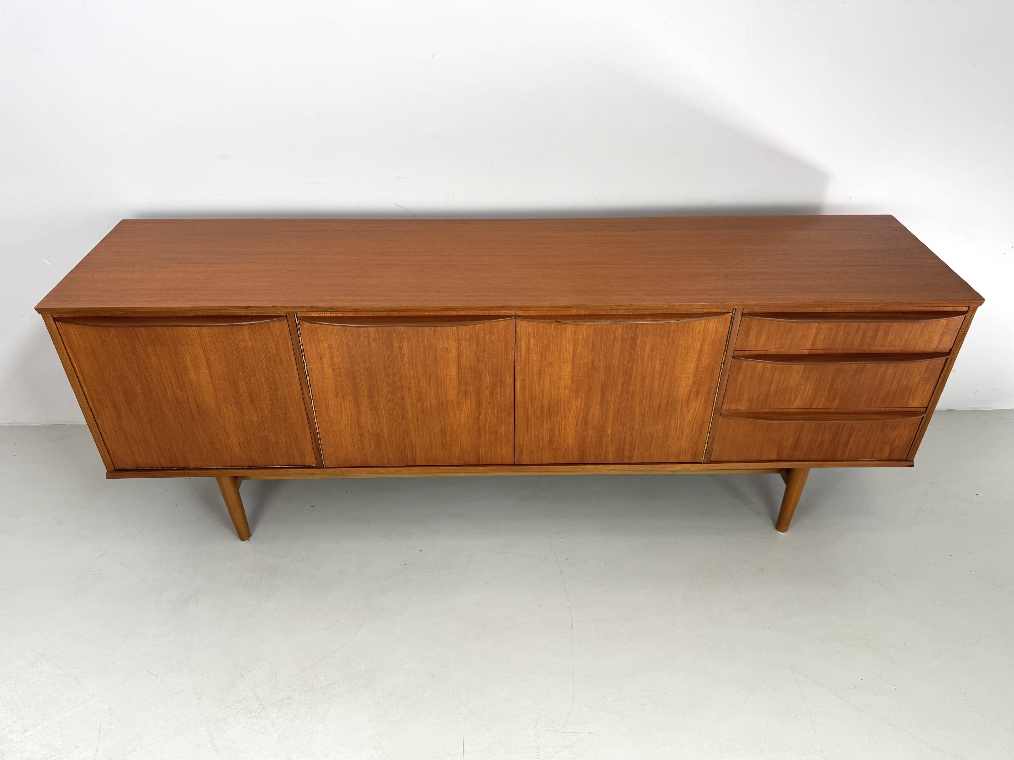 Beautiful vintage sideboard with a sleek design from the 60s.