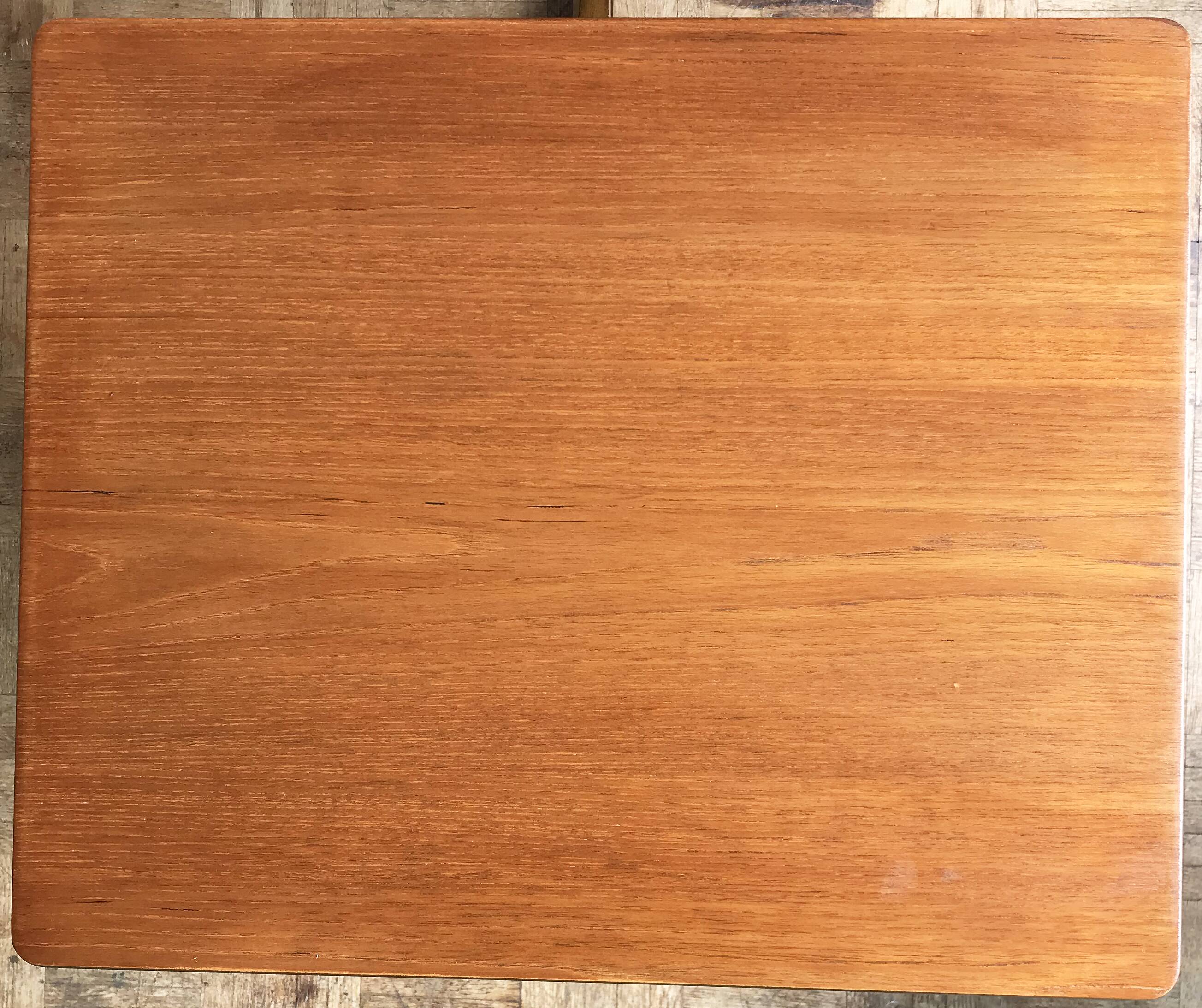 Set of 3 nesting tables from Nathan editions in teak and beech.
