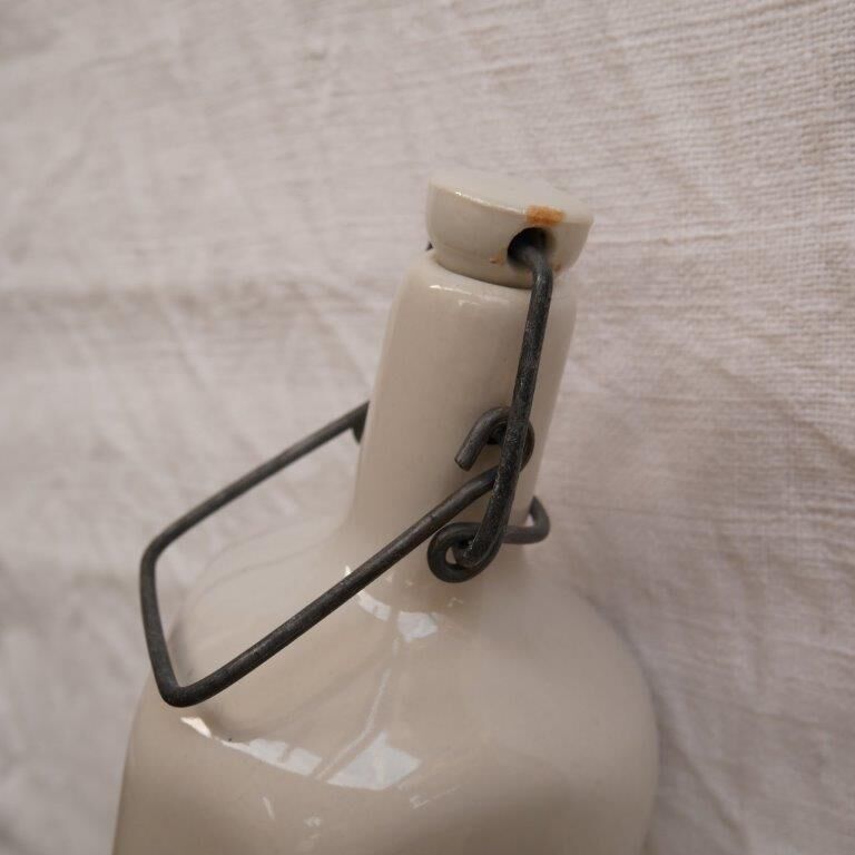 Old stoneware hot water bottle or bottle
