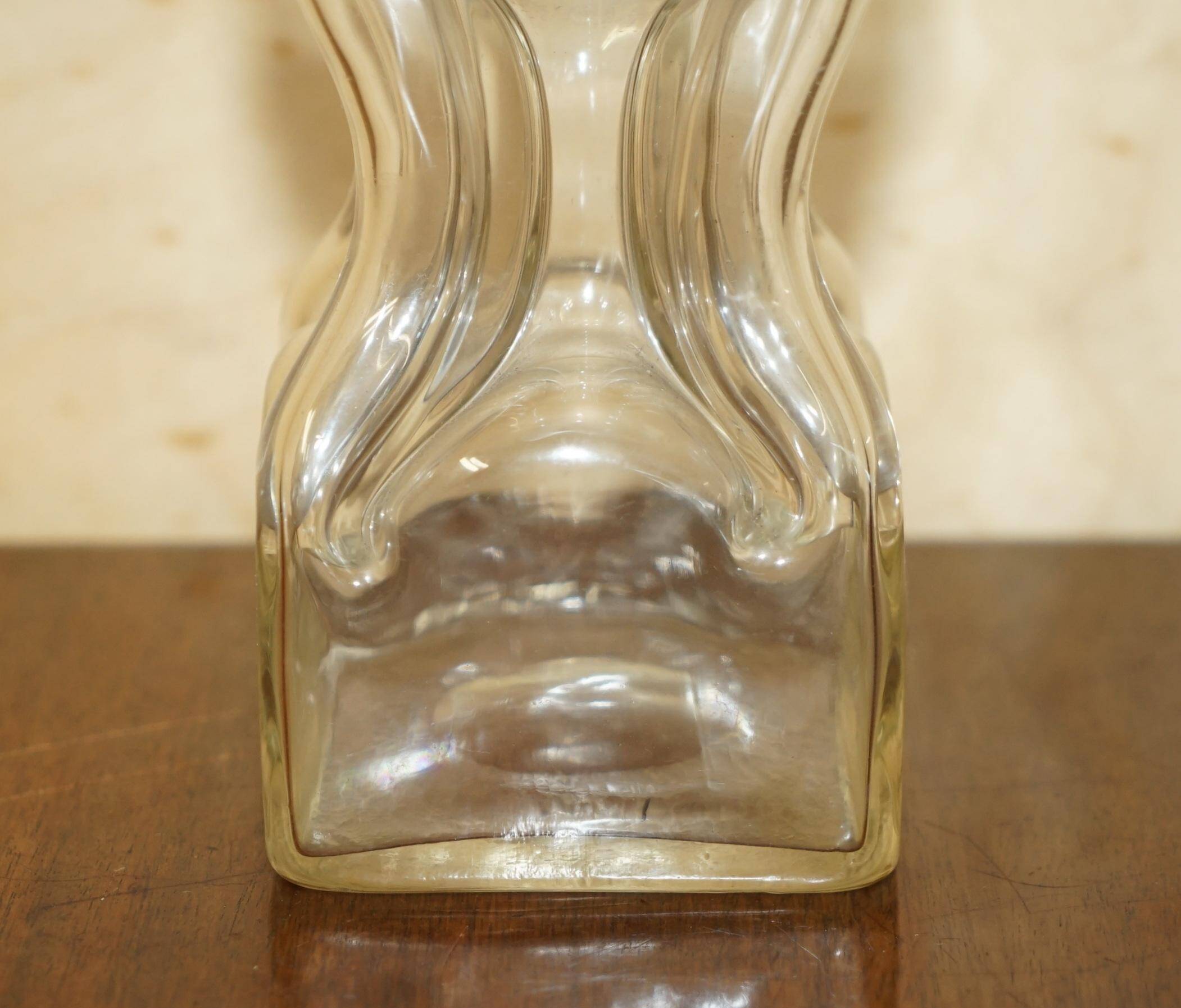 Pair of antique pinched decanters circa 1900 for serving whisky, bourbon, vodka, gin.