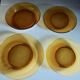 Lot of 4 mismatched plates amber glass