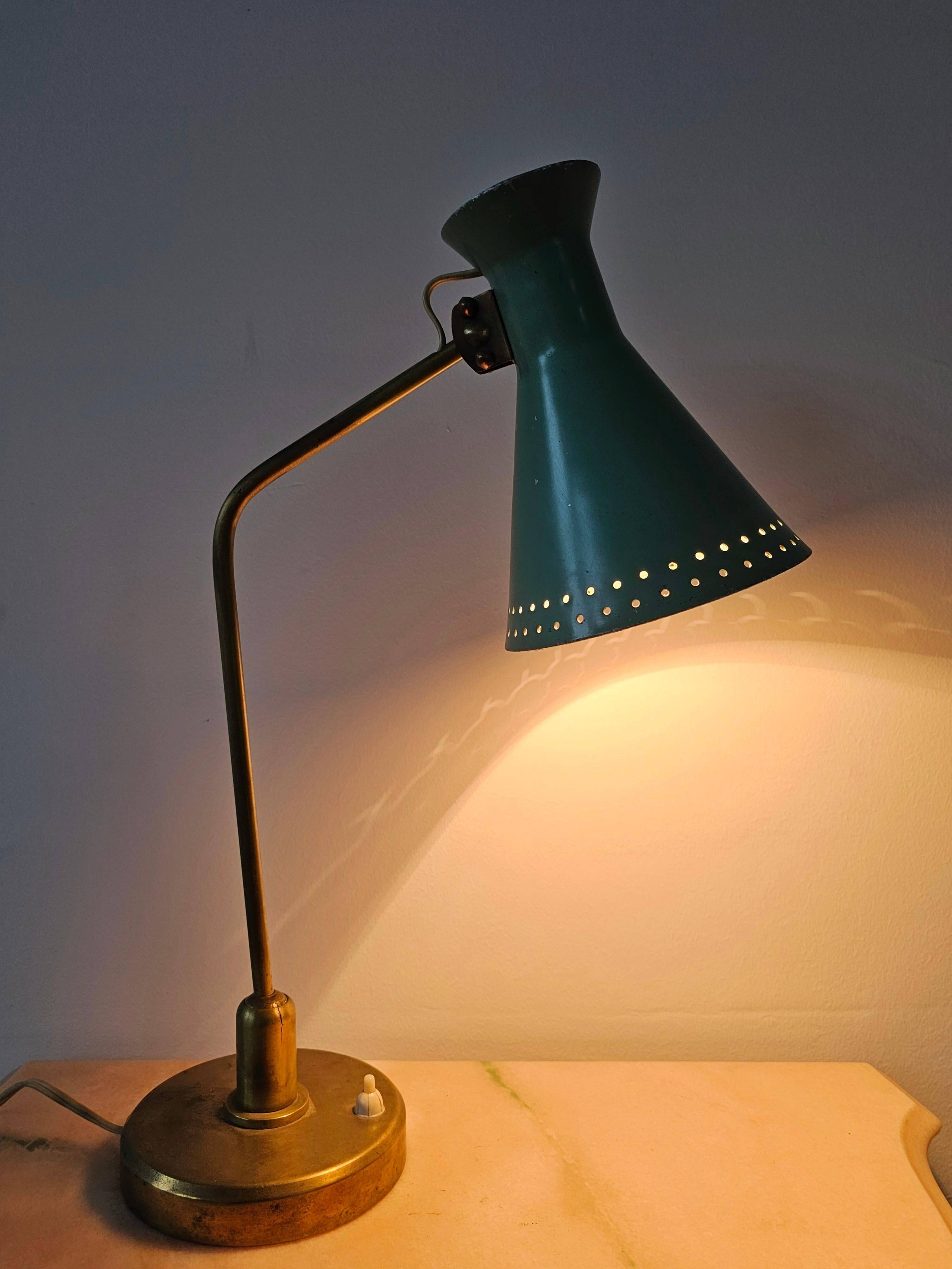 Mid-Century table lamp with a conical metal shade, attributed to Stilnovo.
