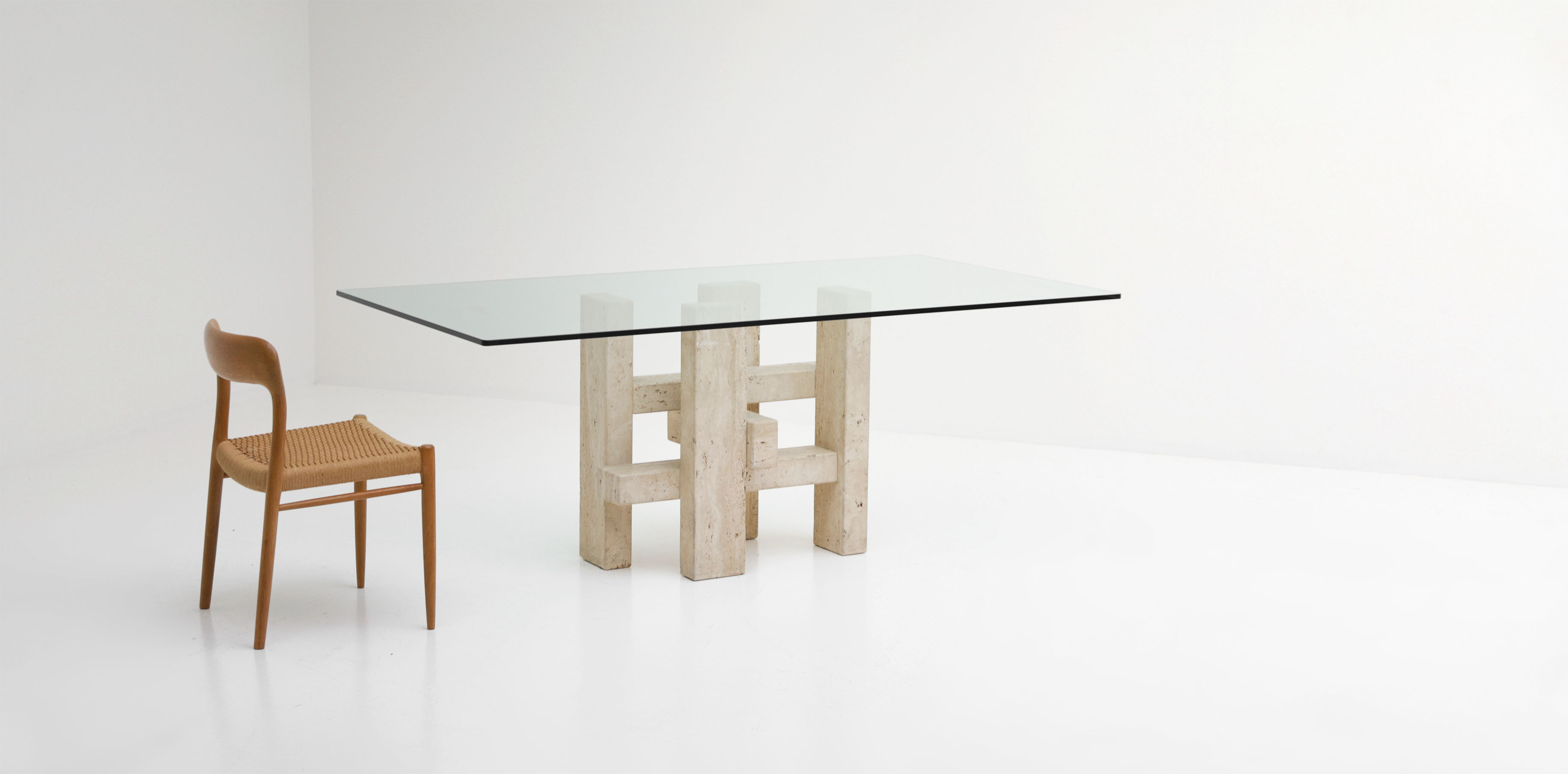 Travertine dining table by Willy Ballez