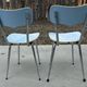 Two blue Formica "Peugeot" chairs.