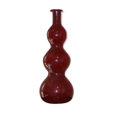 Decorative rounded bottle in red glass, Murano