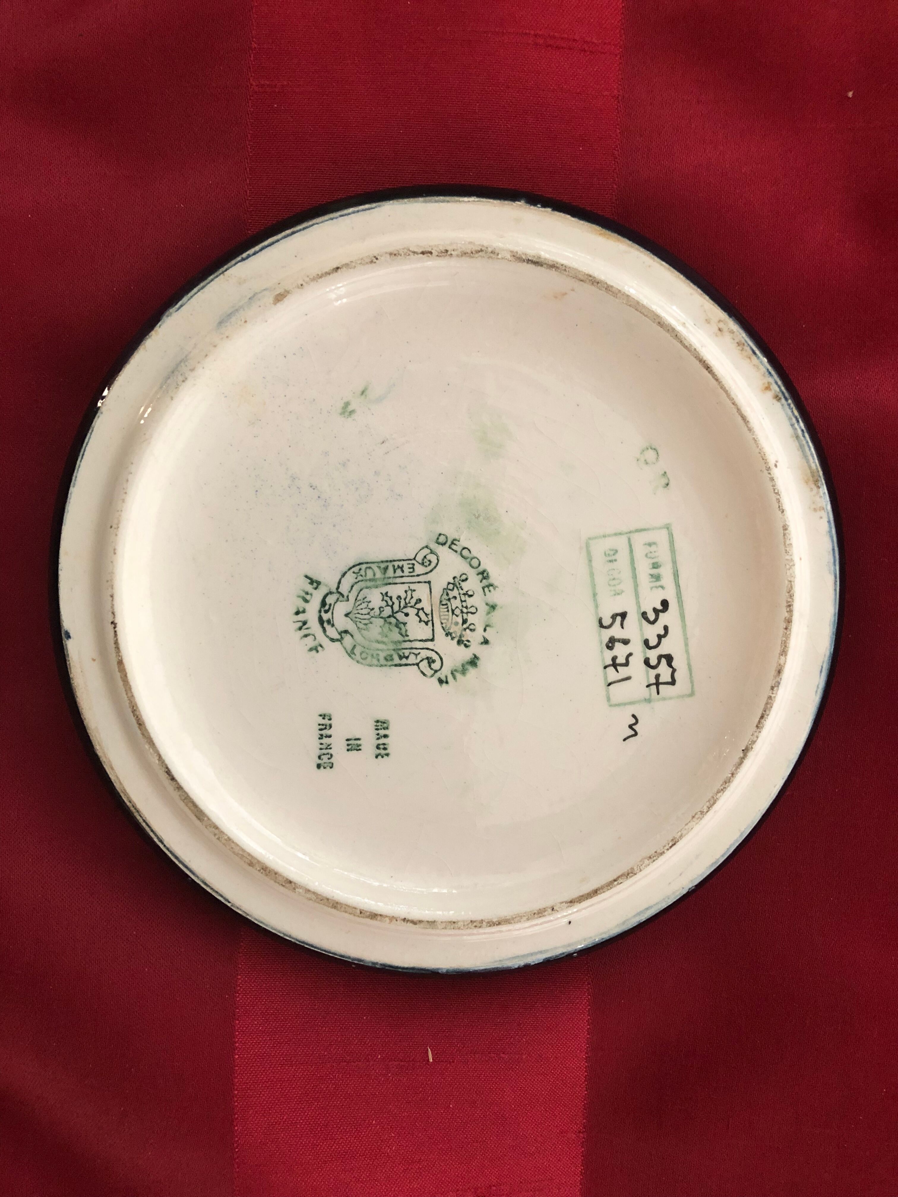 Underside and bottle made of Longwy enamels