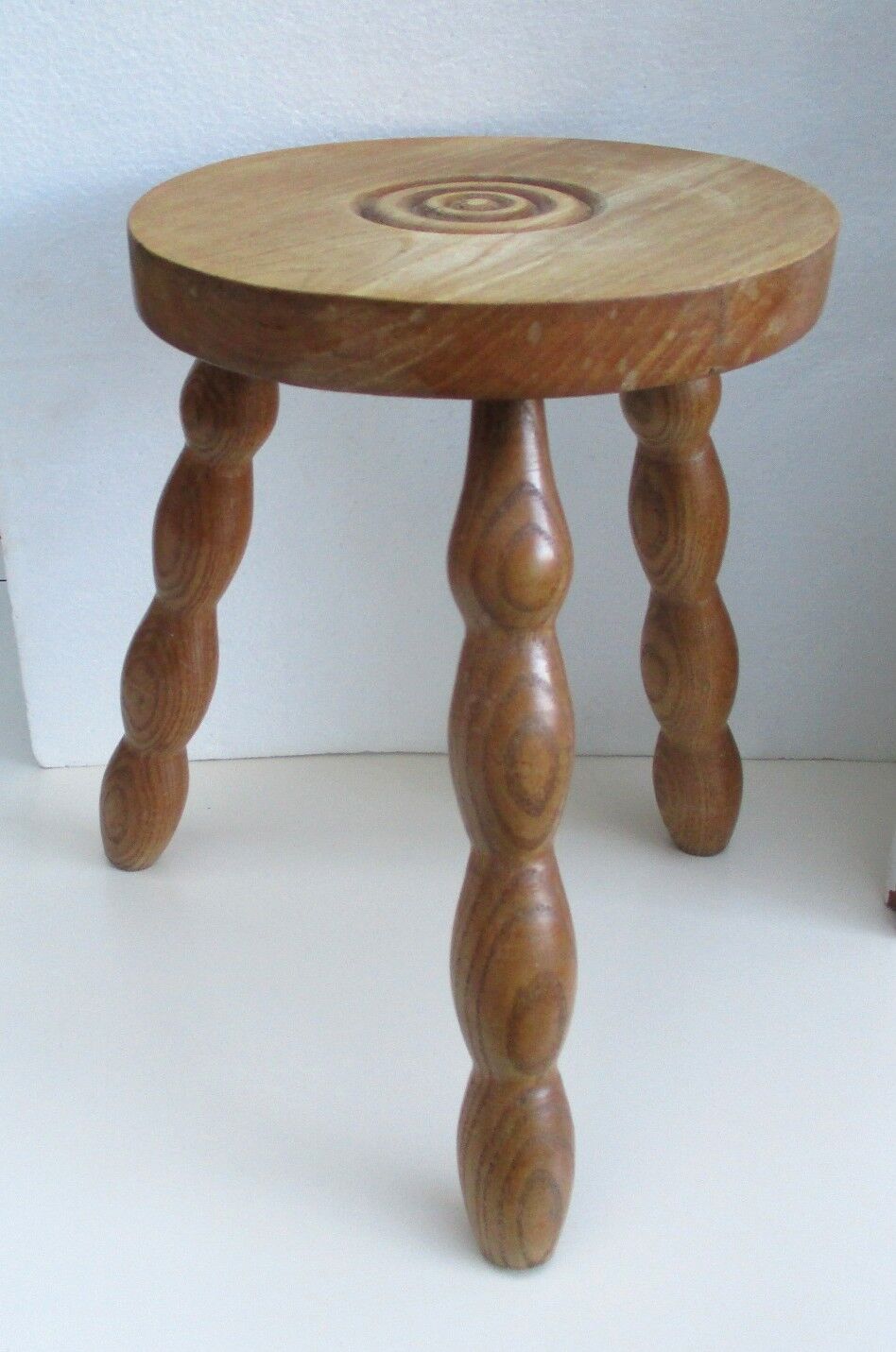 Wooden tripod stool