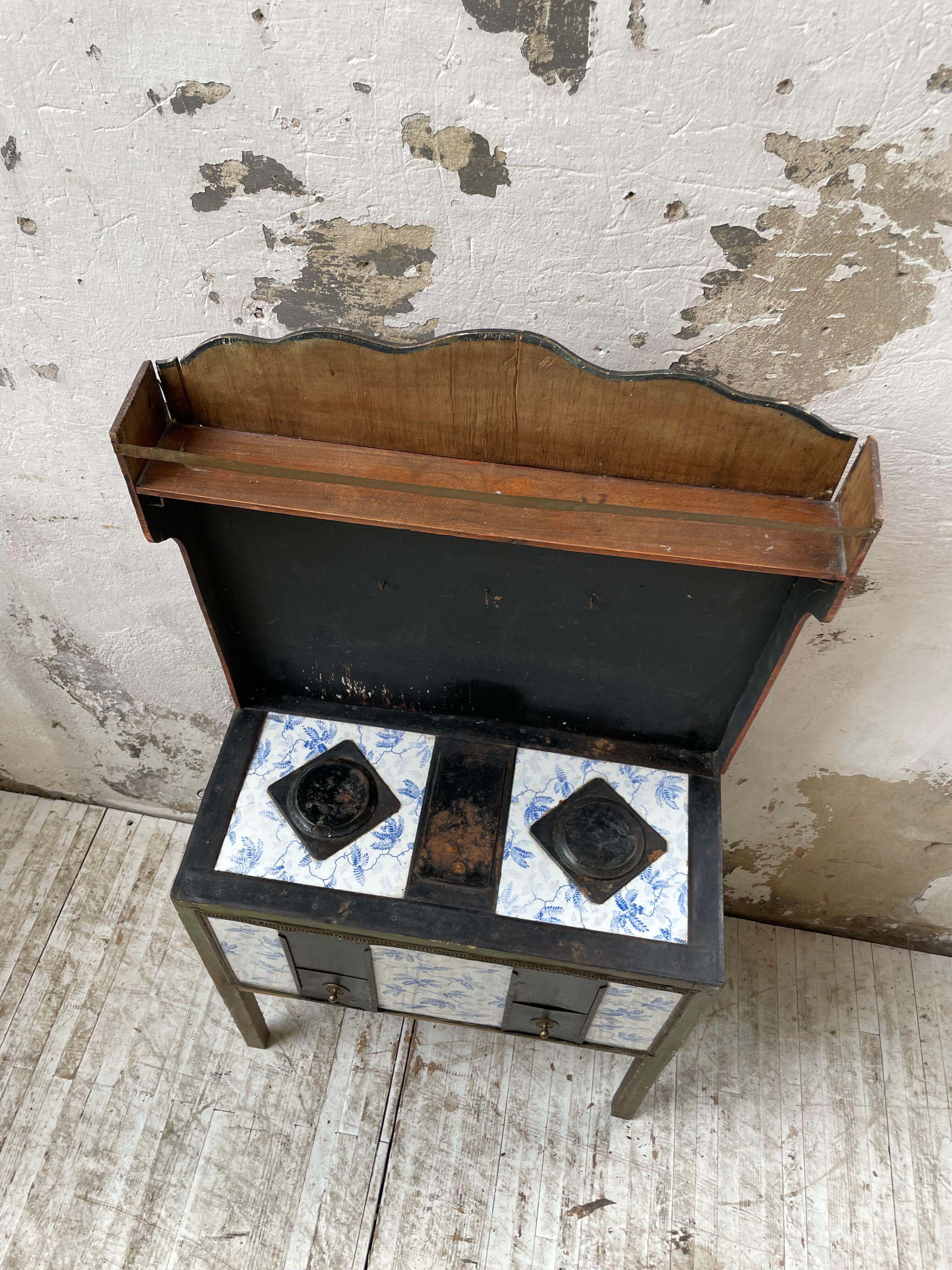 Children's toy stove antique