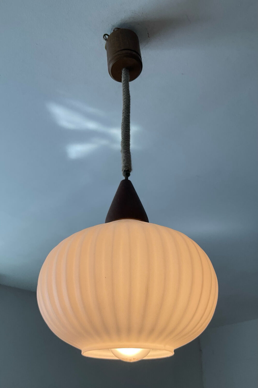 Louis Kalff pendant light in opaline and teak from the 1960s