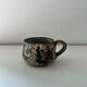 Handcrafted mug with floral decoration