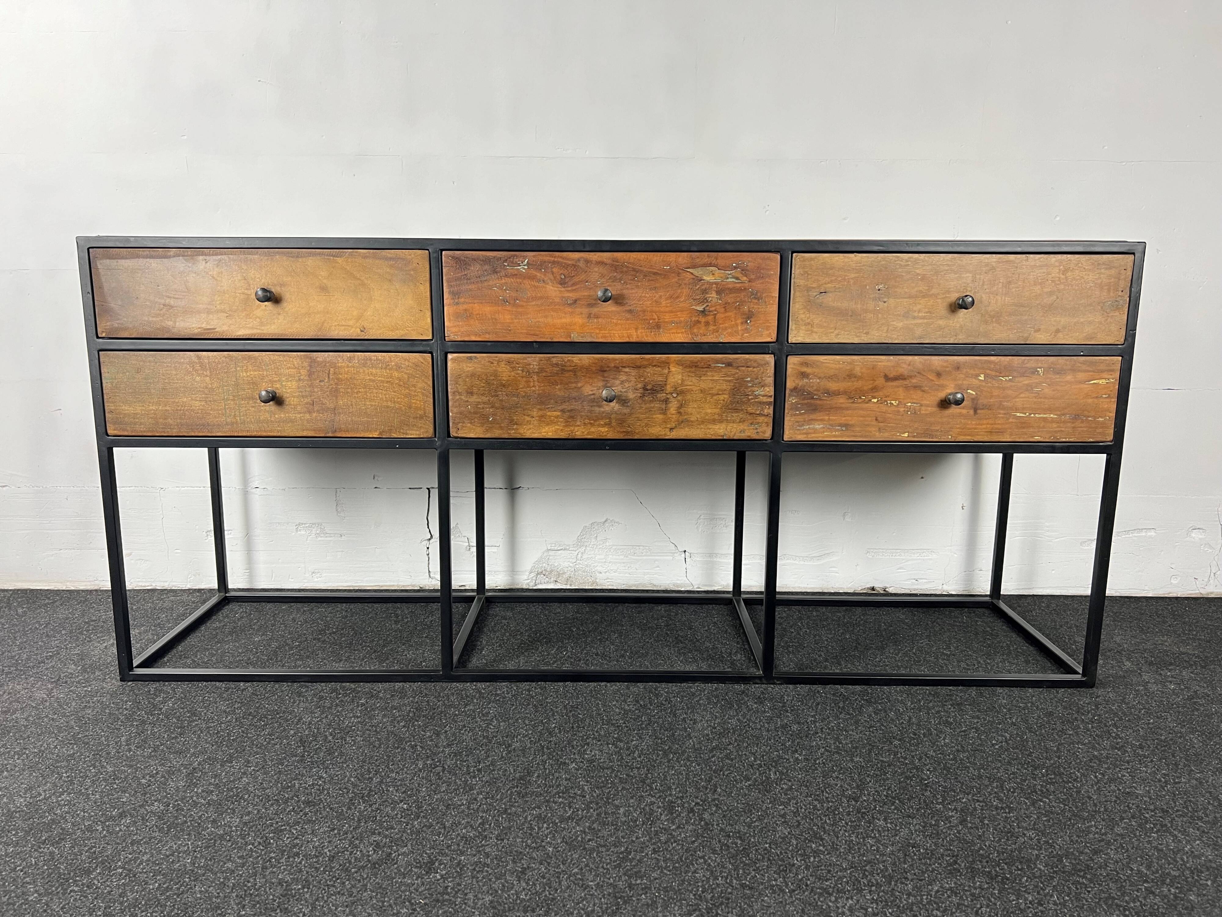 Antique wooden console with black metal base and 6 drawers