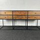 Antique wooden console with black metal base and 6 drawers