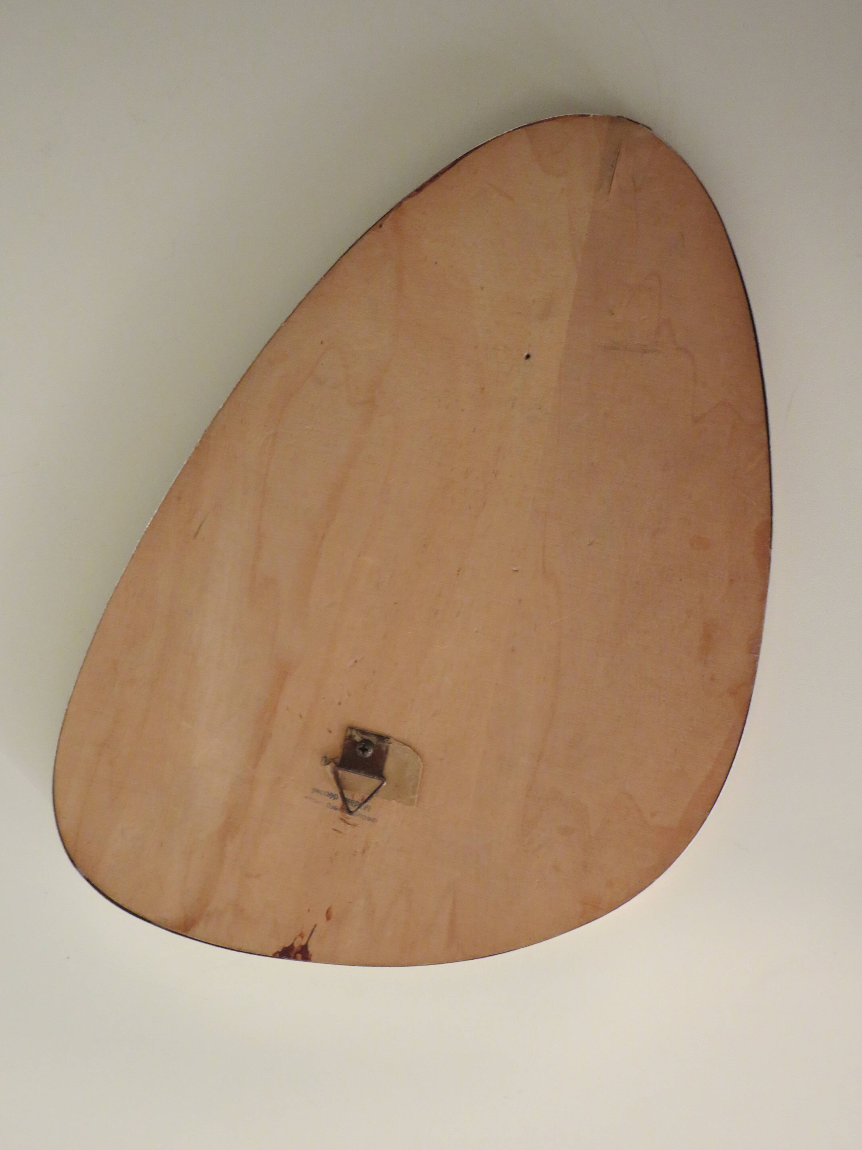 Free-form mirror with gold edge, 1950, 40x27 cm