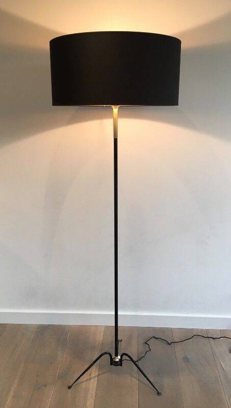 Floor lamp in black lacquered metal and brass