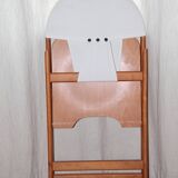 Designer folding chairs in wood and fabric