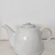 Small white porcelain teapot