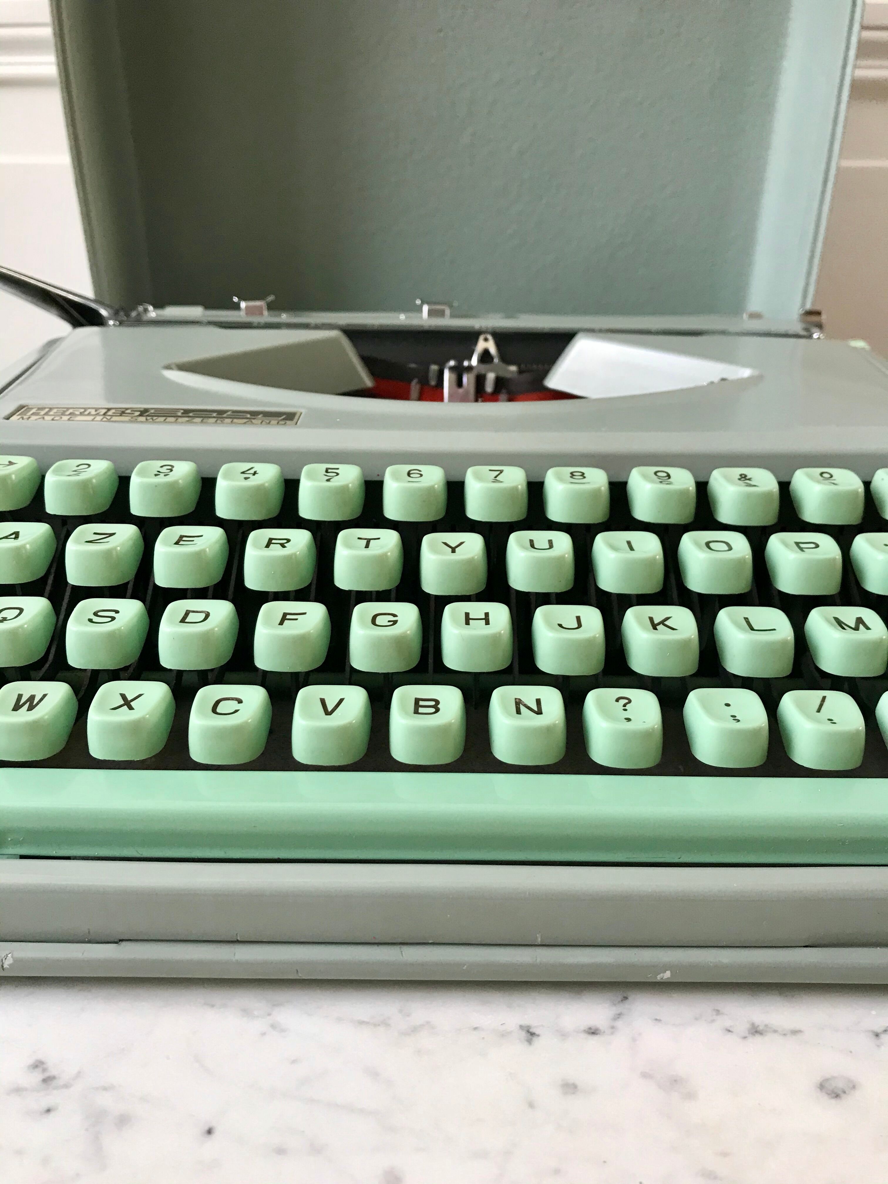 Mint green typewriter hermes baby made in switzerland