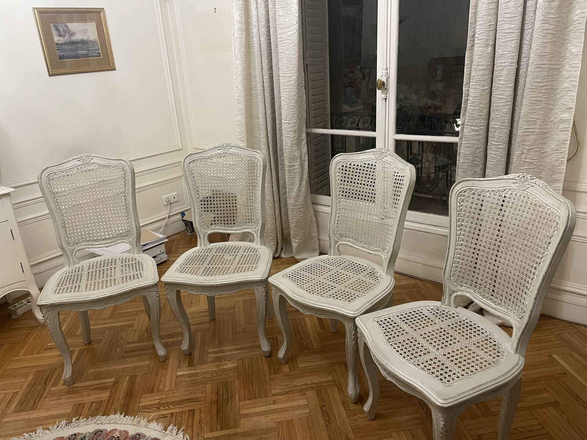 Set of 4 white caned chairs in Louis XV style.