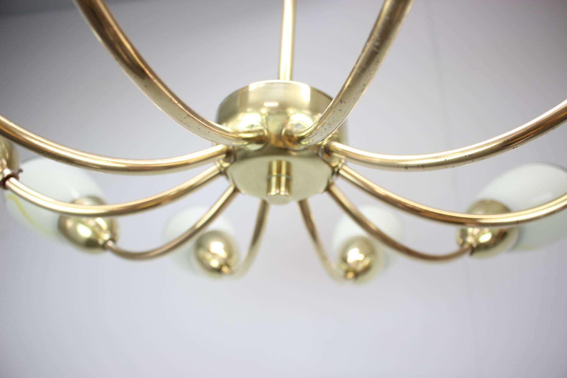 Brass and glass ten-arm chandelier from the mid-century, 1960s.