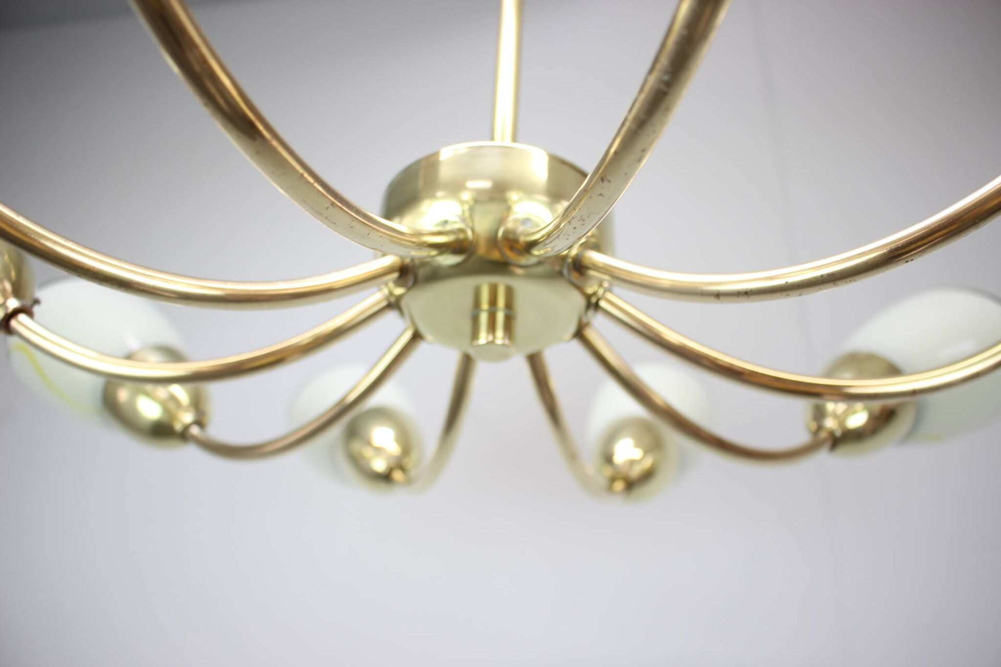 Brass and glass ten-arm chandelier from the mid-century, 1960s.