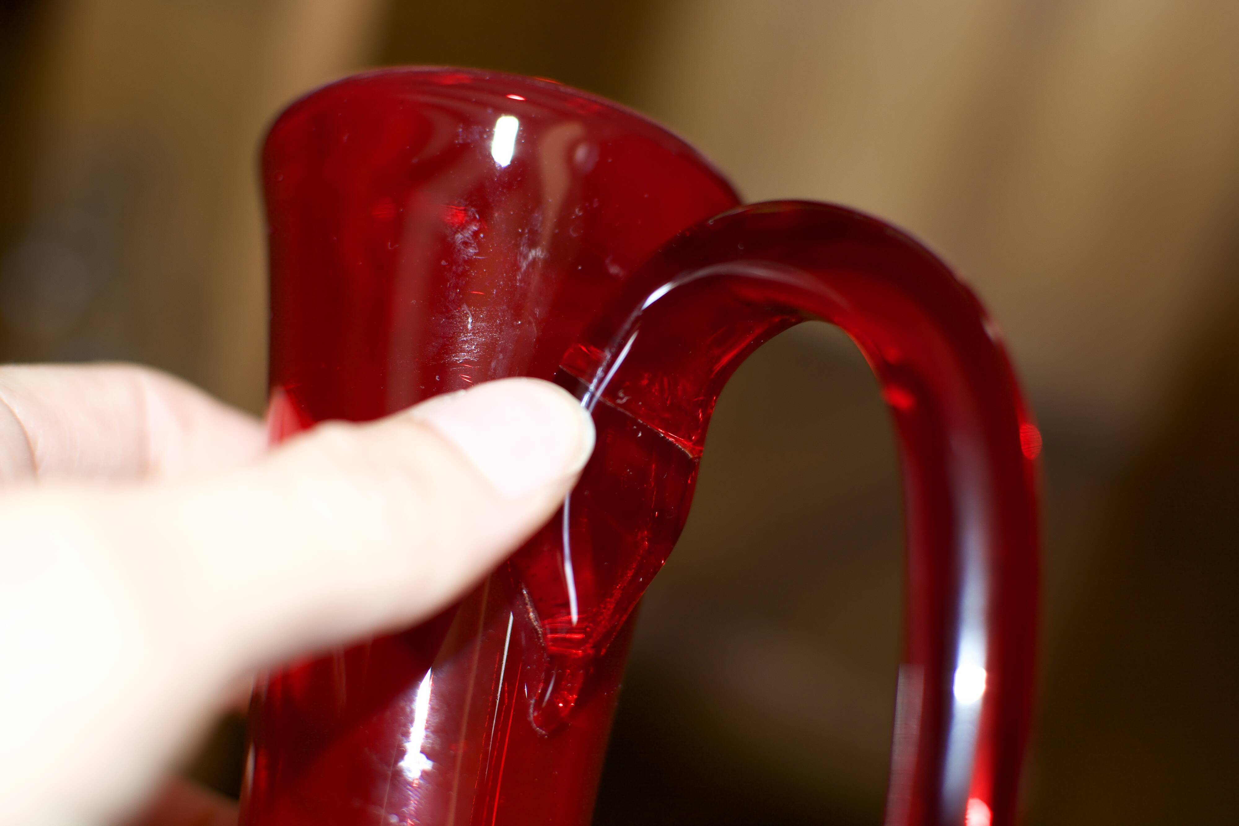 Pair of vintage blown glass pitchers