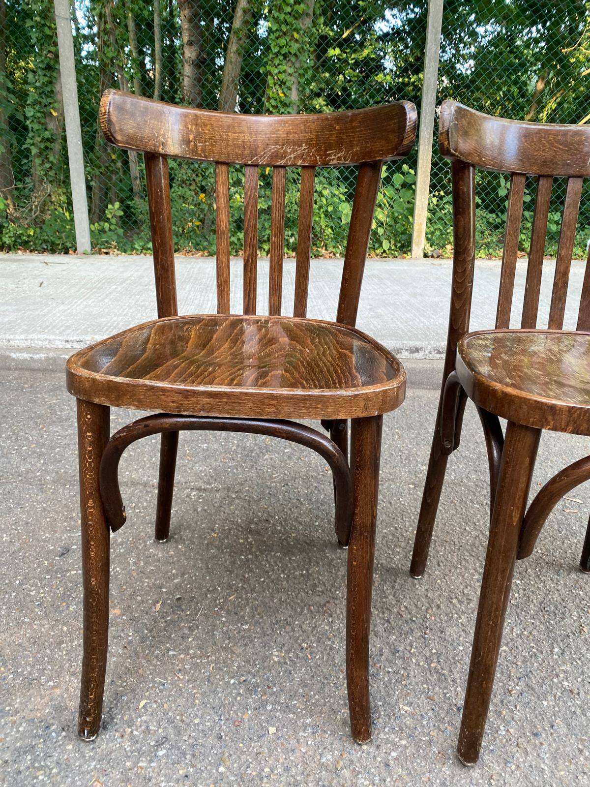 2 solid wood curved walnut bistro chairs in burgundy