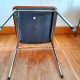 Three mid-century chairs in faux leather and chrome from the 1950s.