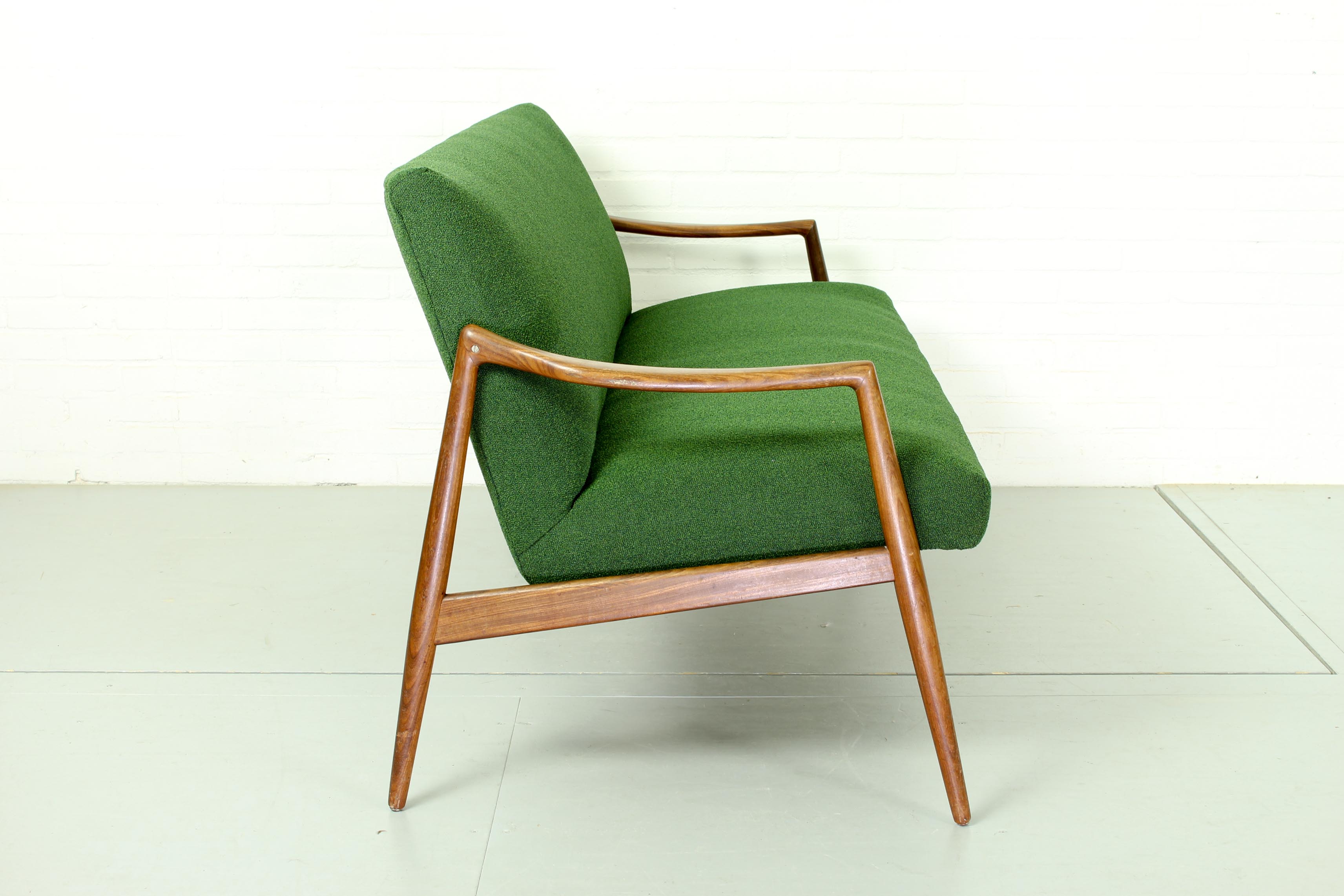 Dutch mid century 2-seater sofa with  teak legs and armrests