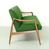 Dutch mid century 2-seater sofa with  teak legs and armrests