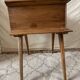 Scandinavian style bedside table with tapered legs from the 1960s.