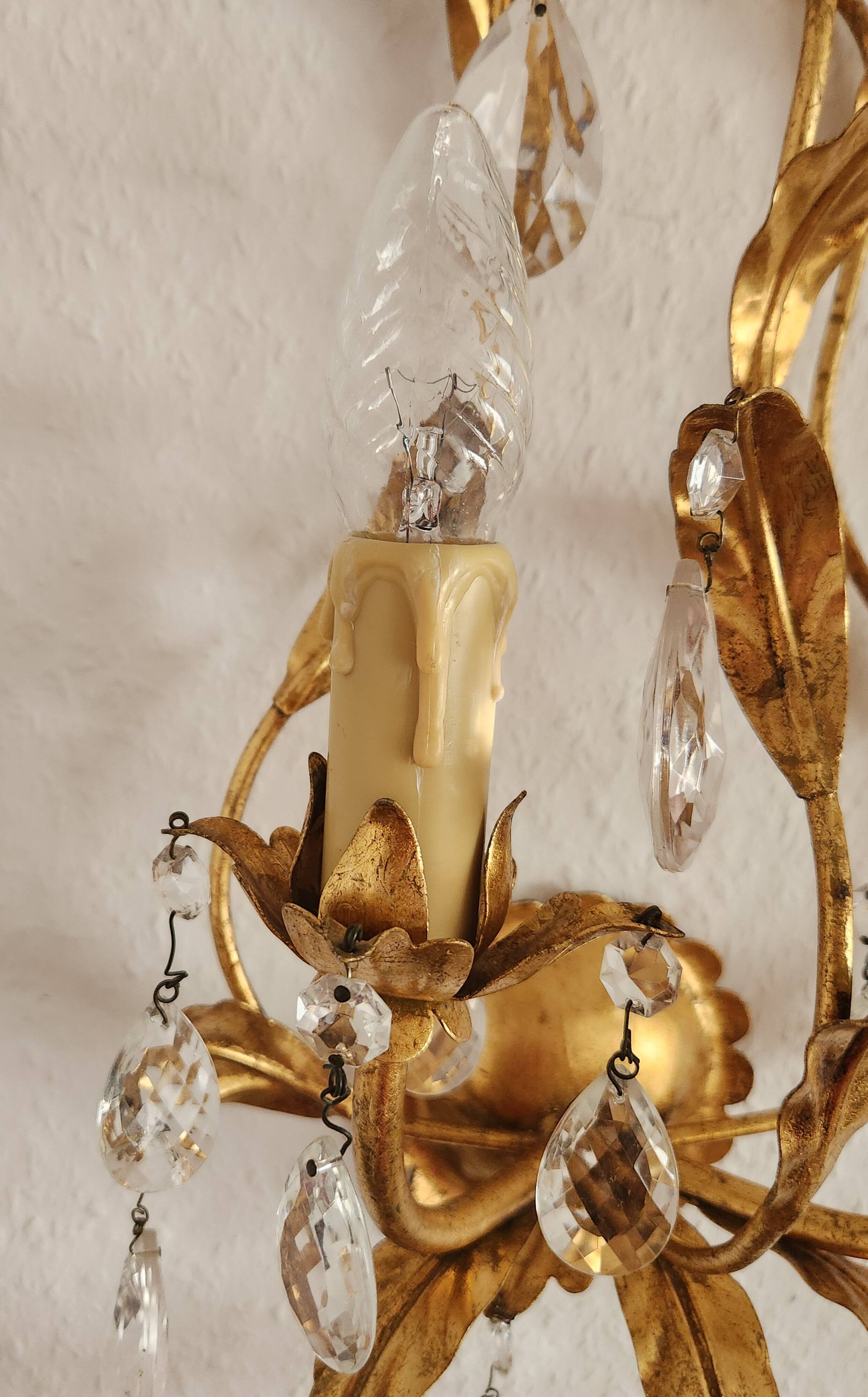 Hand-forged wall lamp gilded with gold leaf and crystals, Italy