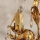Hand-forged wall lamp gilded with gold leaf and crystals, Italy