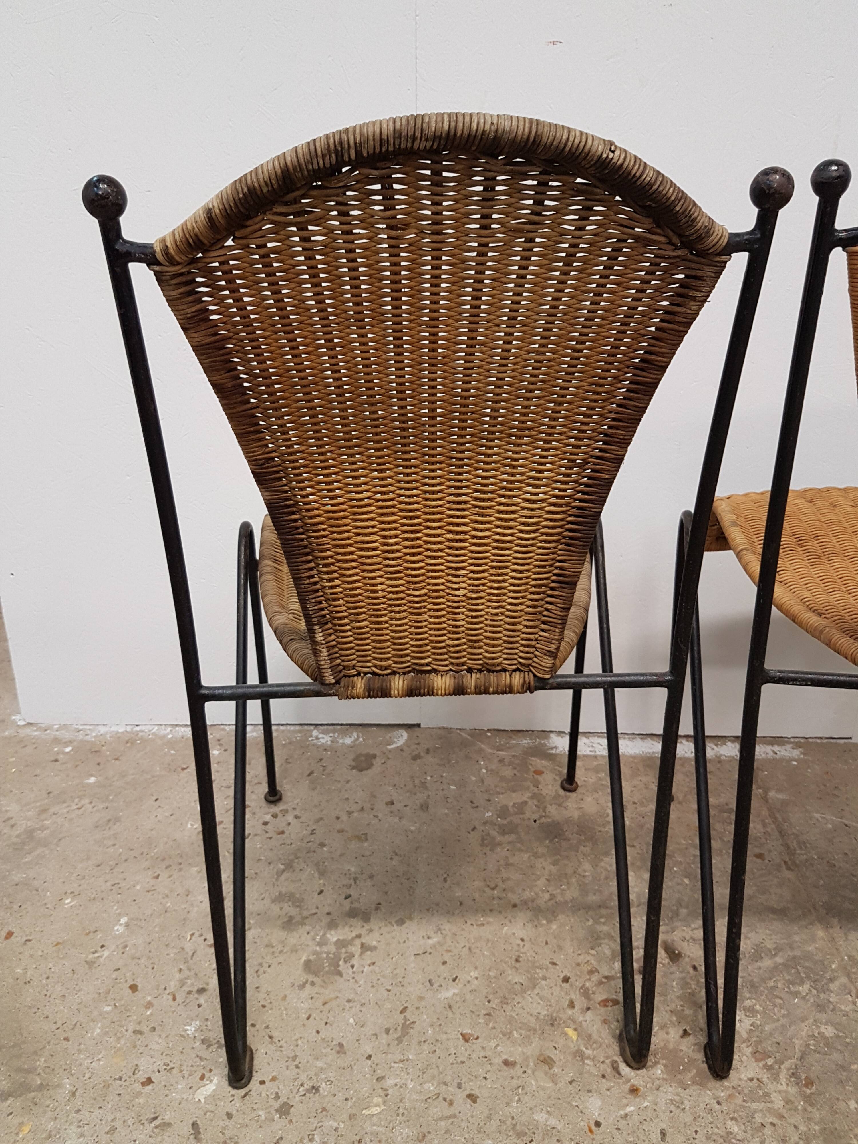Vintage wicker and black steel chair