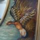 Oval mirror in duck pattern frame